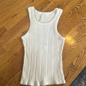 Anthropologie tank (sweater like). Cream color. Razor edges.